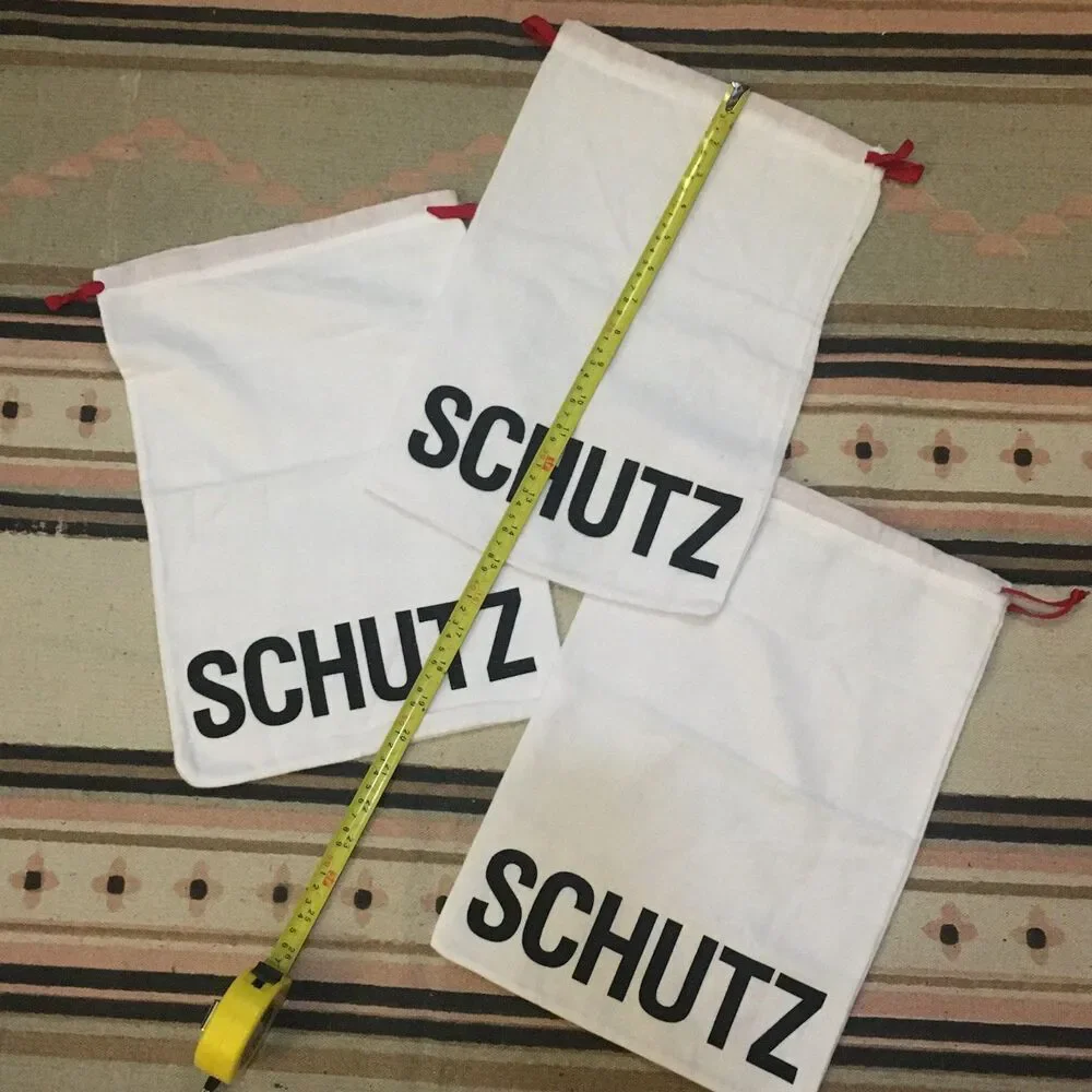 Three (3) Schutz white w/ black lettering soft material Dust bag 15” x 10”